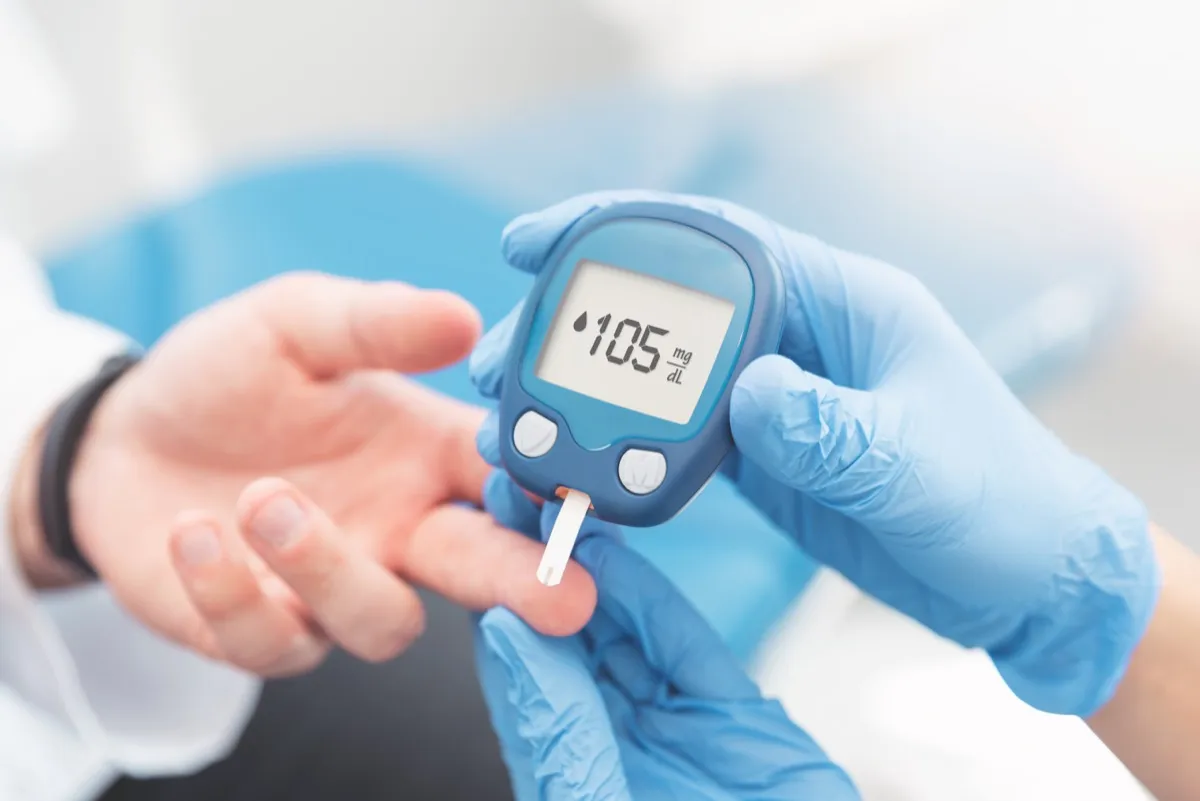 a doctor who checks blood sugar levels